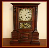 Atkins Clock Company, Bristol, CT. - 'London' Model - Solid Rosewood Case - 8 Day Mechanical Movement - Unbelievable Overall Original Condition - Shelf Clock - (circa 1863 - 1876)
