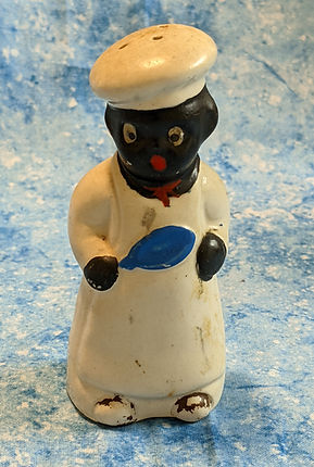 Tom - dressed in a chefs uniform with blue kitchen spoon - domestic servant - ceramic figurine