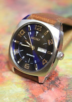 Seiko - 7S26-04D0 - 21 Jewel Automatic Movement, HUGE Barrel Shaped all Stainless Steel Case with a Dark Blue Dial - Day and Date - Arabic Numerals Wristwatch (circa 2016)