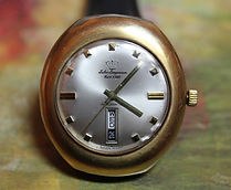 Jules Jurgenson - 14K Gold Filled Large Cushion Case - Day and Date at 6 o'clock Wristwatch - (circa 1970s)