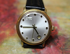 Wyler - Incaflex - Pearl Quad Dial with a Round Date Window at the 5 o'clock position - Wristwatch - (circa 1960s)