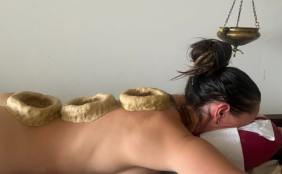 Me during external back Basti treatment, to deeply nourish the spine.