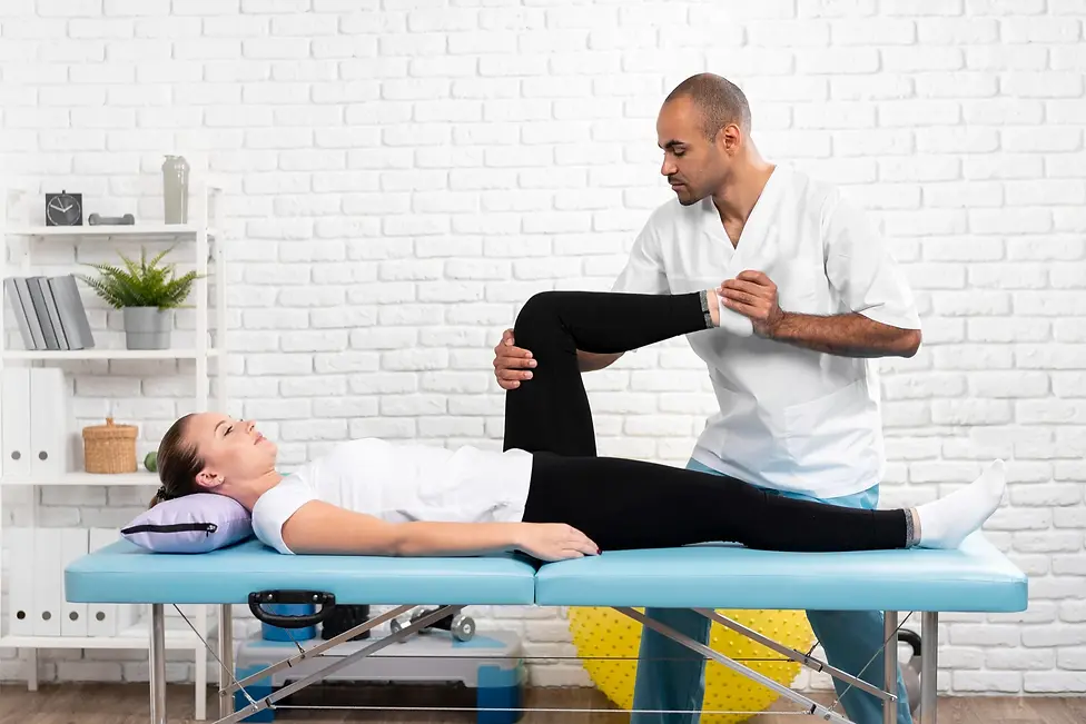 male-physiotherapist-checking-woman-s-leg.webp