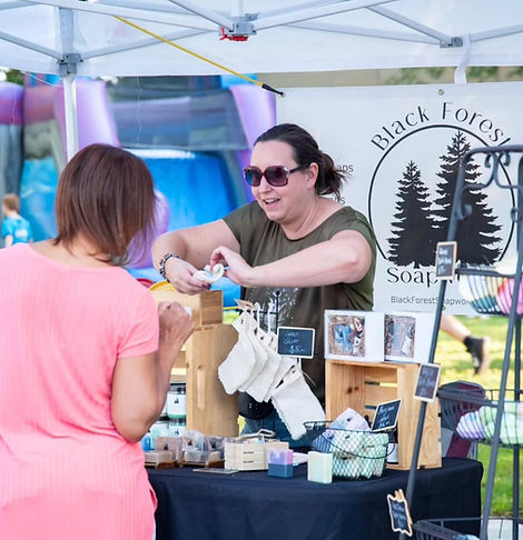 Local vendor booth at a downtown Cornelius community event.