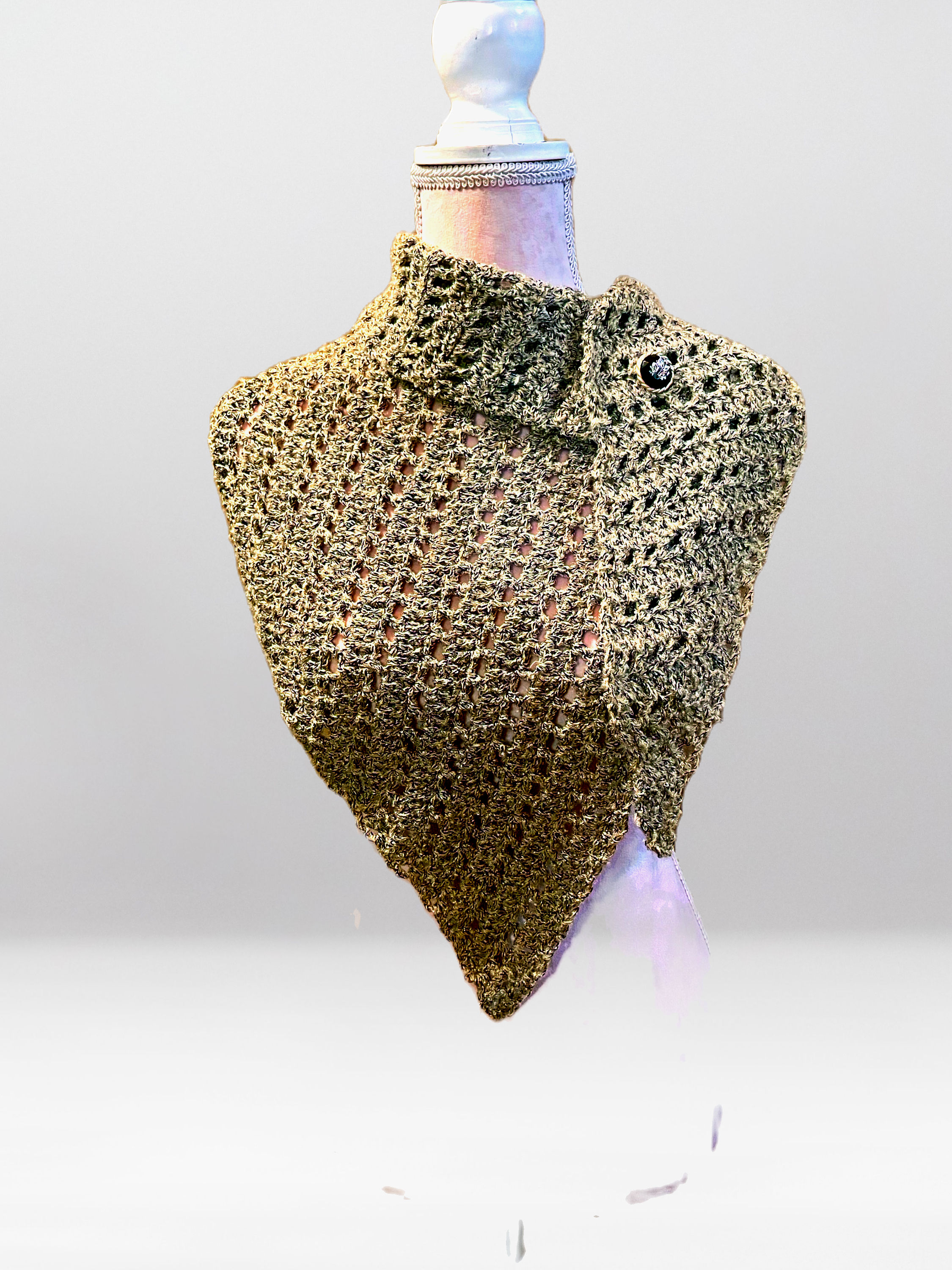 Hand crocheted triangle scarf; gold and tinge of black with black and gold butt