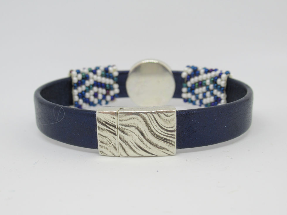 Thumbnail: Navy leather flat band bracelet with hand beaded blue-purple-white sleeves