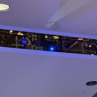 Looking up at the newly installed projector