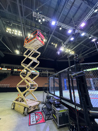 Adjusting spotlights for the fighter walk-in area