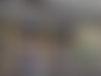 Two TVs behind the restaurant bar