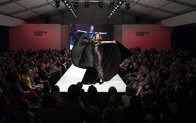 Model performs at Lloyd Klein Runway