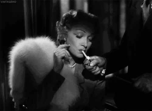 Marlene Dietrich smoking in an animated gif