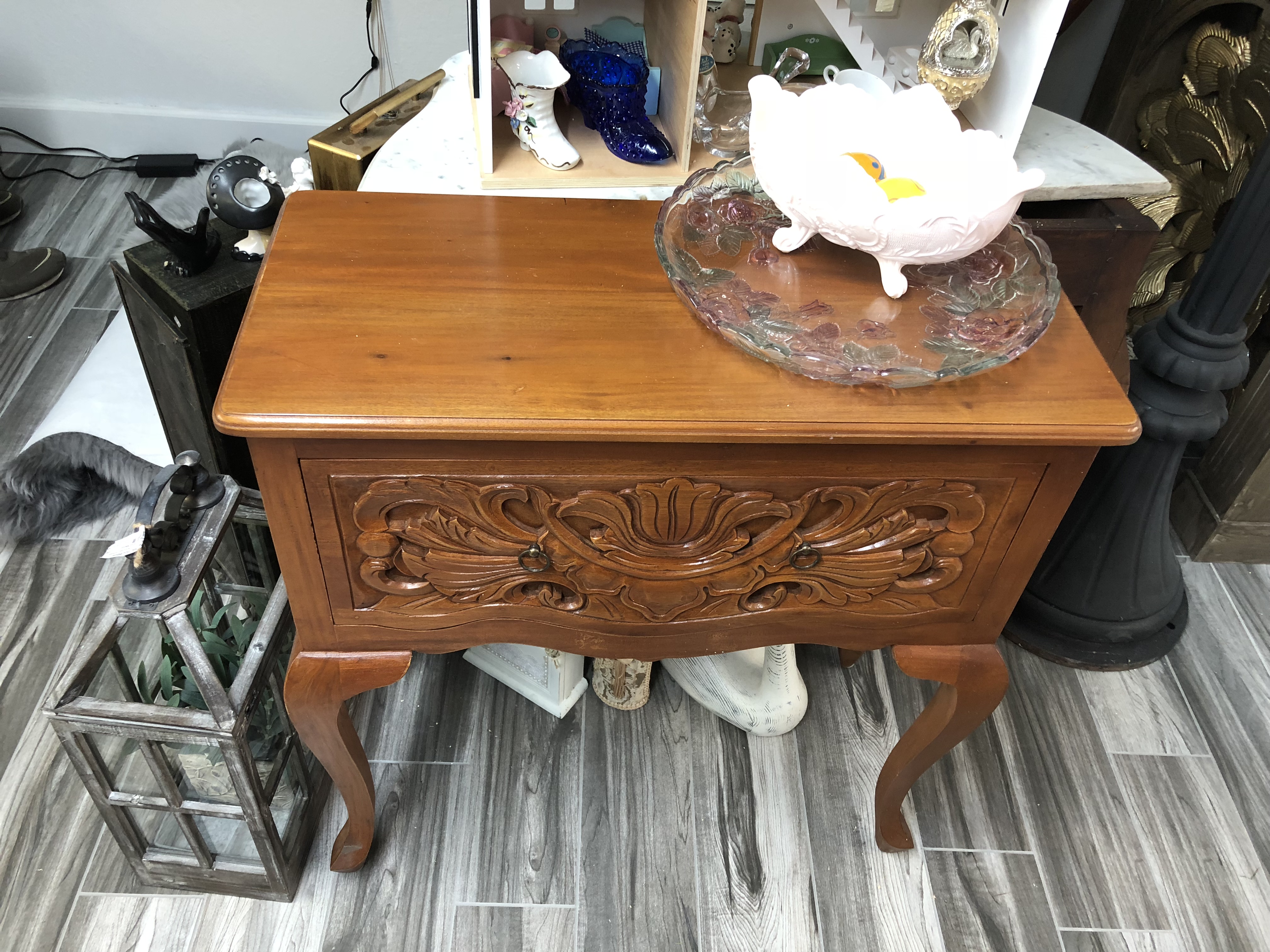 carved accent table