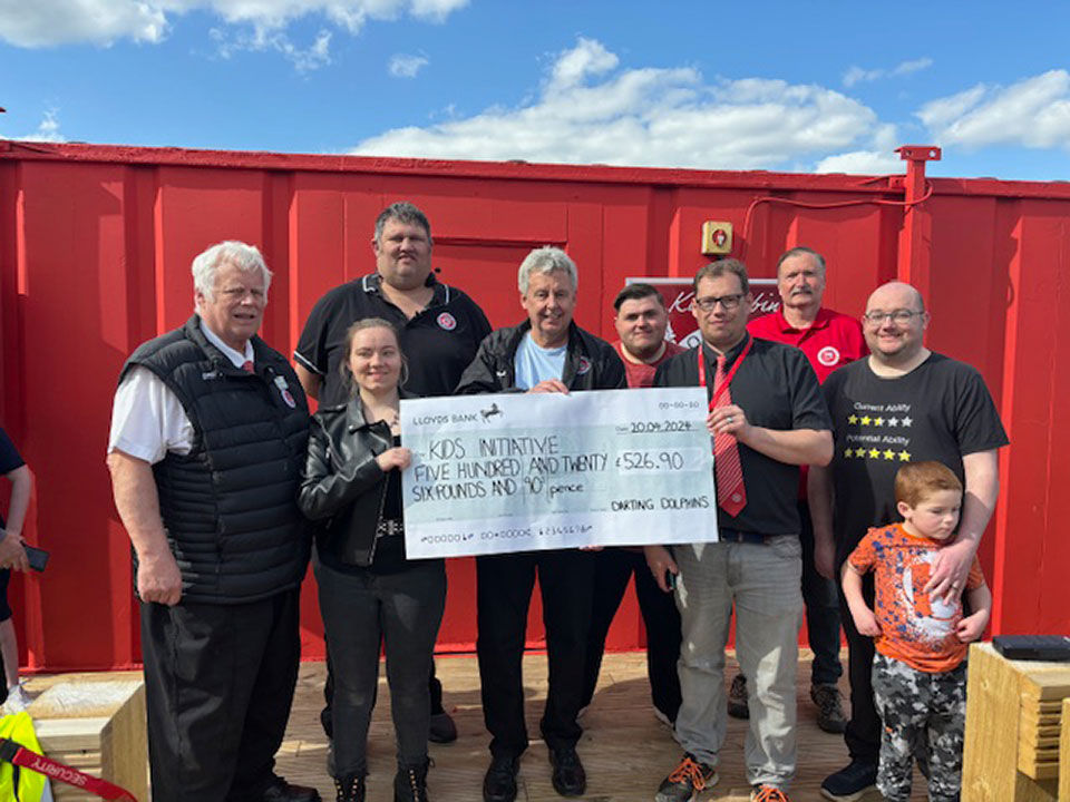 Another Kids Initiative donation from the Darting Dolphins