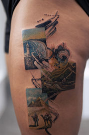 Colorful art tattoo on thigh, landscape and portrait; BILDER COLOR TATTOO. Andre Zechmann