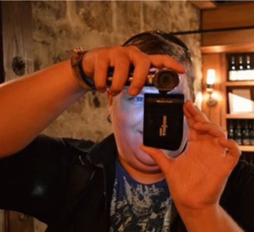 T Whitley w camera.gif