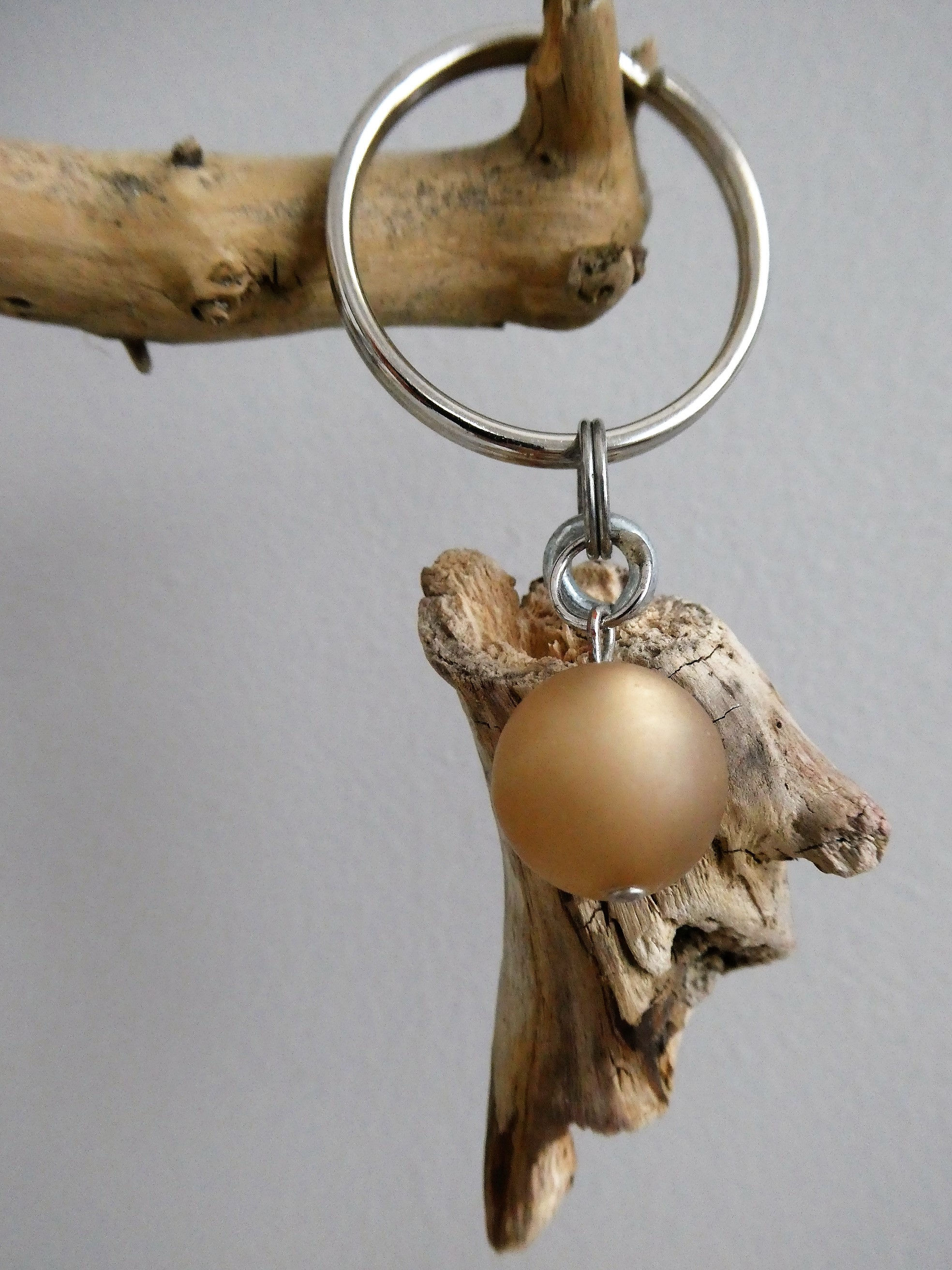 Schlüsselanhänger 6 Perle braun