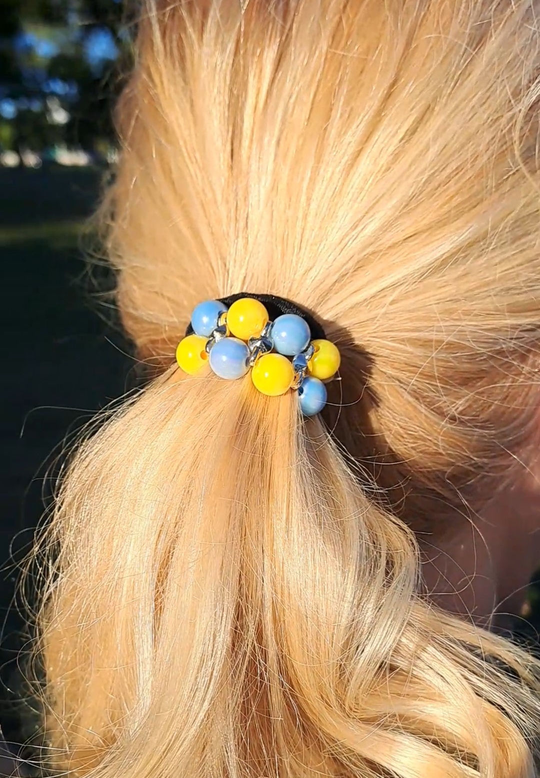Tie with blue-yellow stones