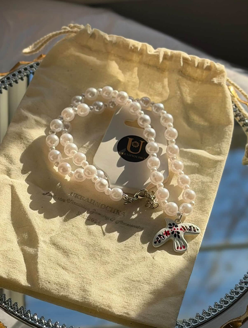 Thumbnail: Hand-Painted Vyshyvanka Pearl Dove Necklace