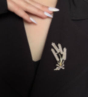 Elegant Wheat Brooch worn on on a black blazer, embodying strength, unity, and the rich Ukrainian culture.