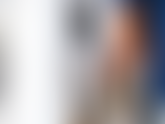 A technician performs hvac maintenance on an outdoor unit, showcasing the reliable service and expertise provided by The Service Pros to keep systems running efficiently.