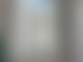 Interior space under renovation by Tampa Bay ADU, showcasing work typical of ADU builders, including wall finishing, window installation, and preparation for the next construction phase