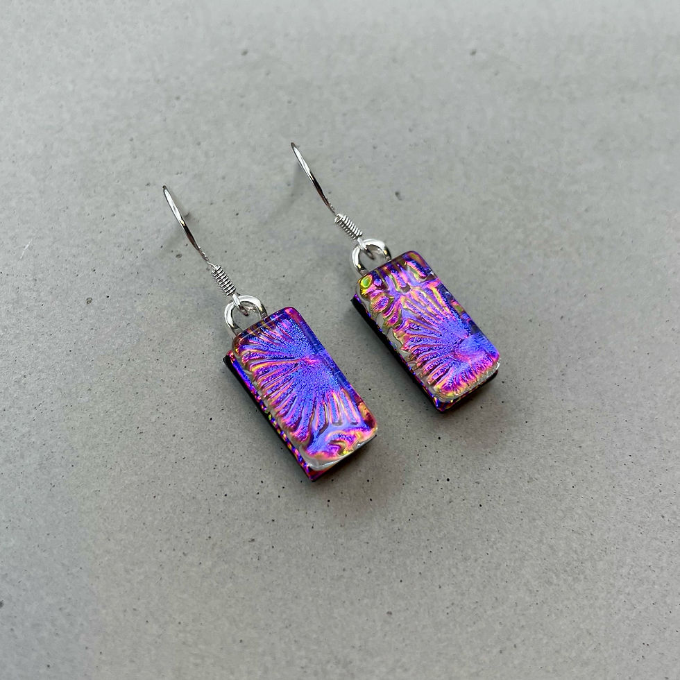 Handmade purple pink flower dichroic fused glass danlge earrings with colour-shifting effect by Jade Tapson.
