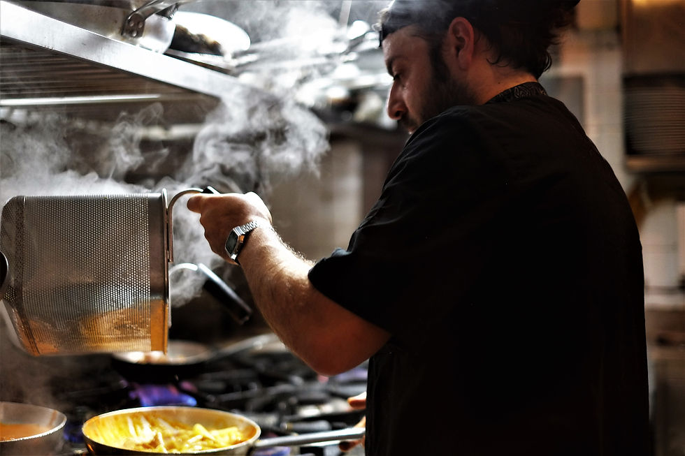 immigrant cooker making fries