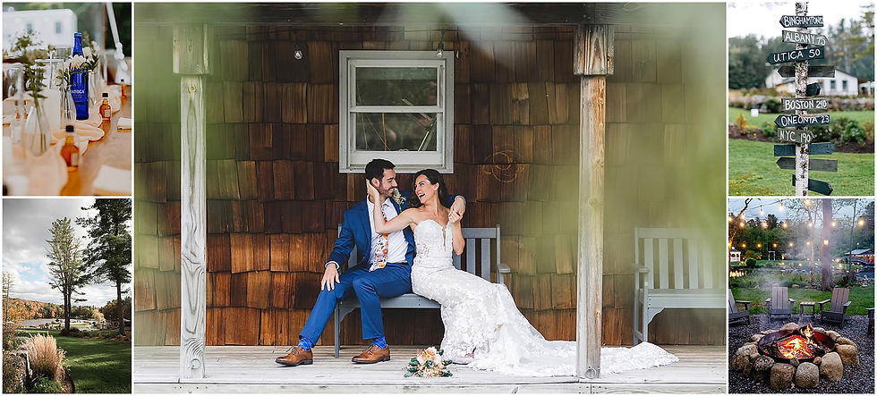 Bride in white gown and groom in blue suit sit on porch smiling. Table setting, signpost, trees, and fire pit with string lights in background. All captured on the Cooperstown outdoor wedding venue, The Rosemary at Spano Lake.