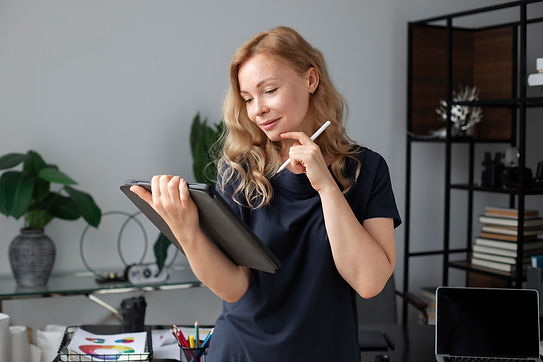 young-female-logo-designer-working-graphic-tablet.jpg