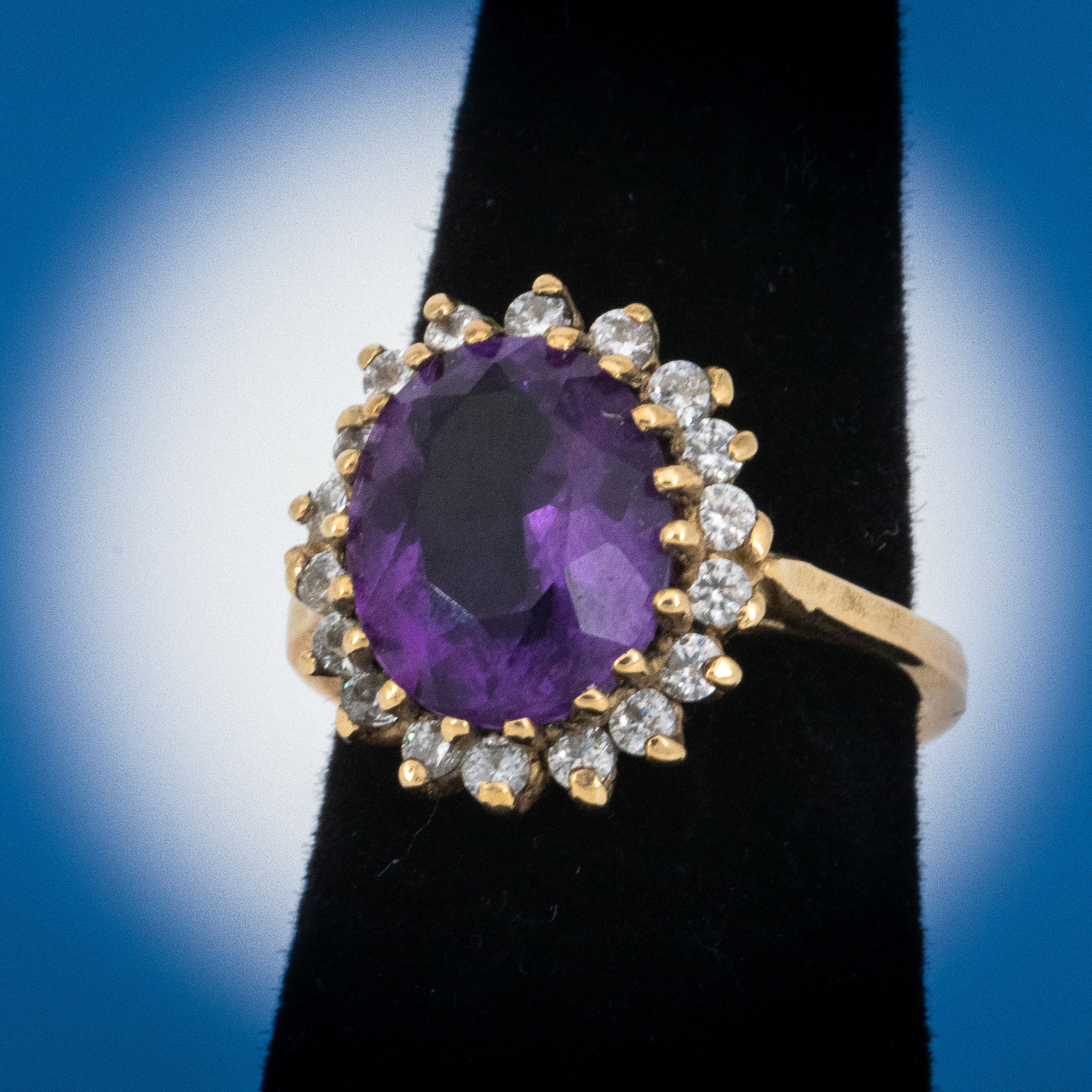Amethyst and CZs in 14k yellow gold ring