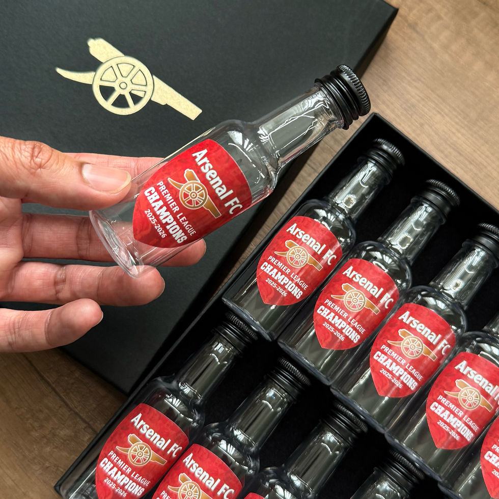 Thumbnail: Arsenal bottle the league champions gift