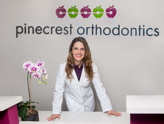 Corporate portrait of woman at pinecrest orthodontics office by Miami portrait photographer Kathleen Ballard Photography