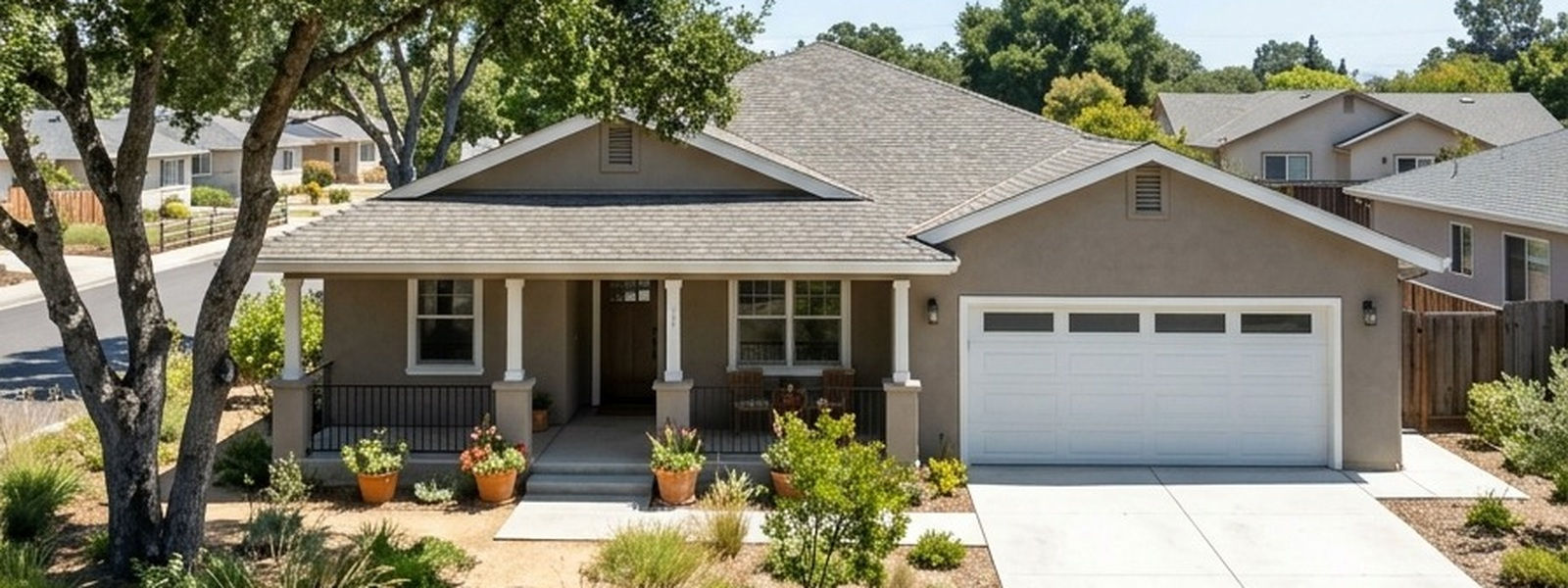 Silicon Valley single-story home with covered front porch, mature trees, landscaped yard and attached garage