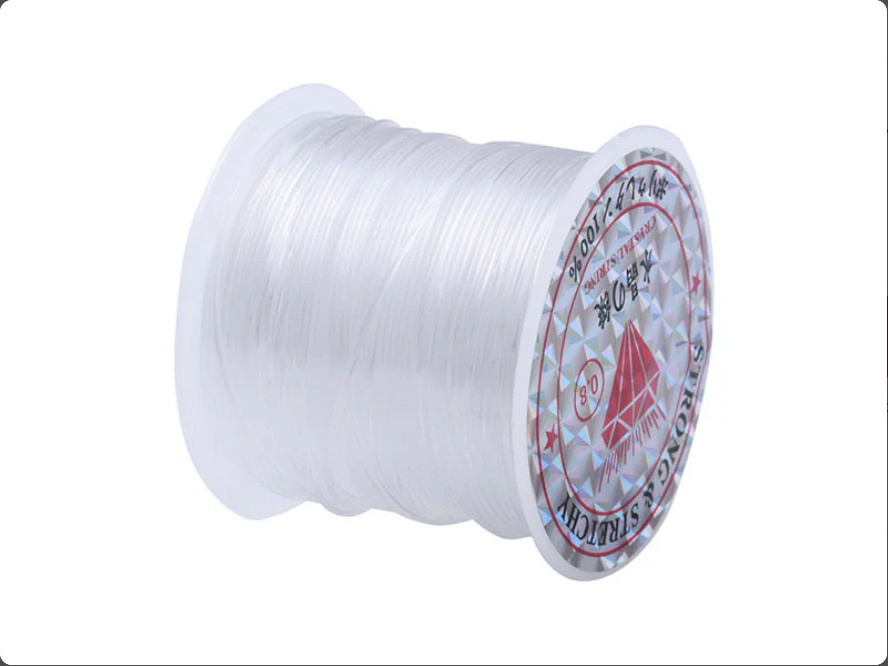 Bobine de fil nylon transparent de 8m et 0,8mm de diamètre.