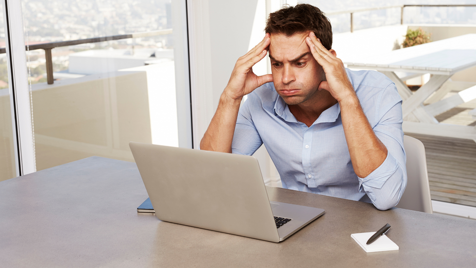 Man overwhelmed by decisions