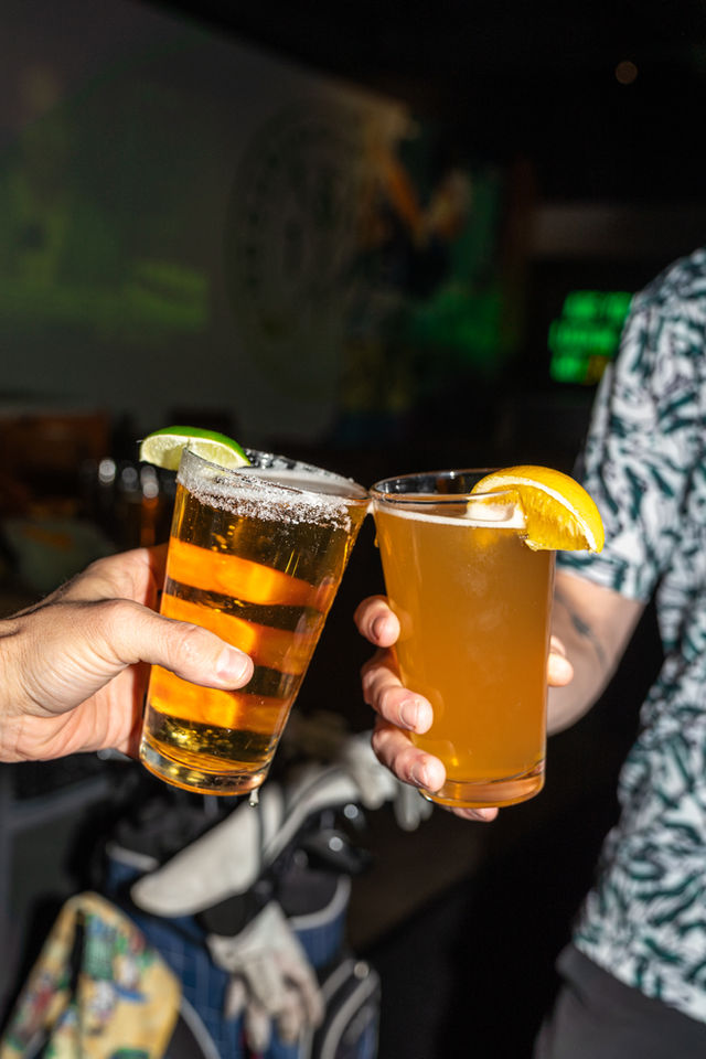 2 people drinking beer