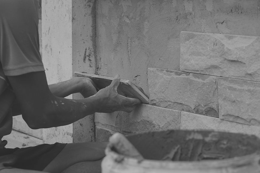 proffesional-tiler-wall-tile-installation-workers-laying-tiles-wall-diy-it-yourself-concep