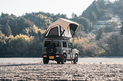 [peakpod] Image 3 of the lightest rooftop tent installed on a compact SUV.