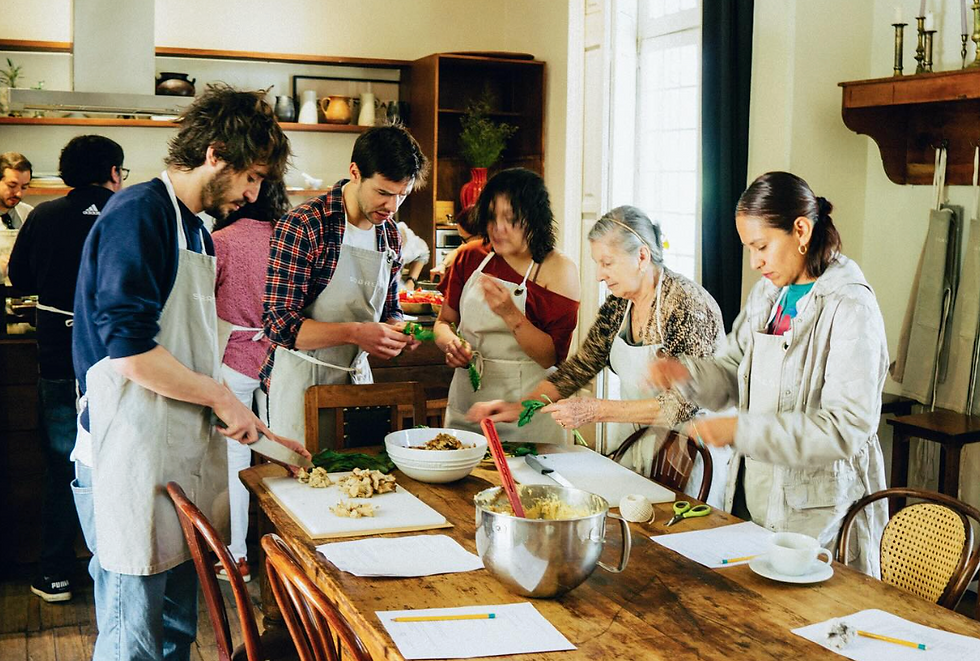 Team building experience with people having a cooking class in mexico city