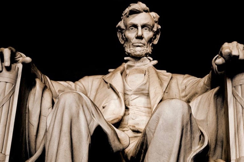 A majestic view of the Lincoln Memorial, symbolizing Abraham Lincoln's enduring legacy as a defender of freedom and democracy.