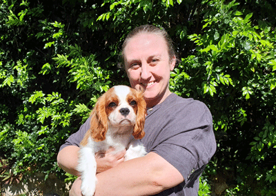 Cavrealm Cavalier Puppy River with owner