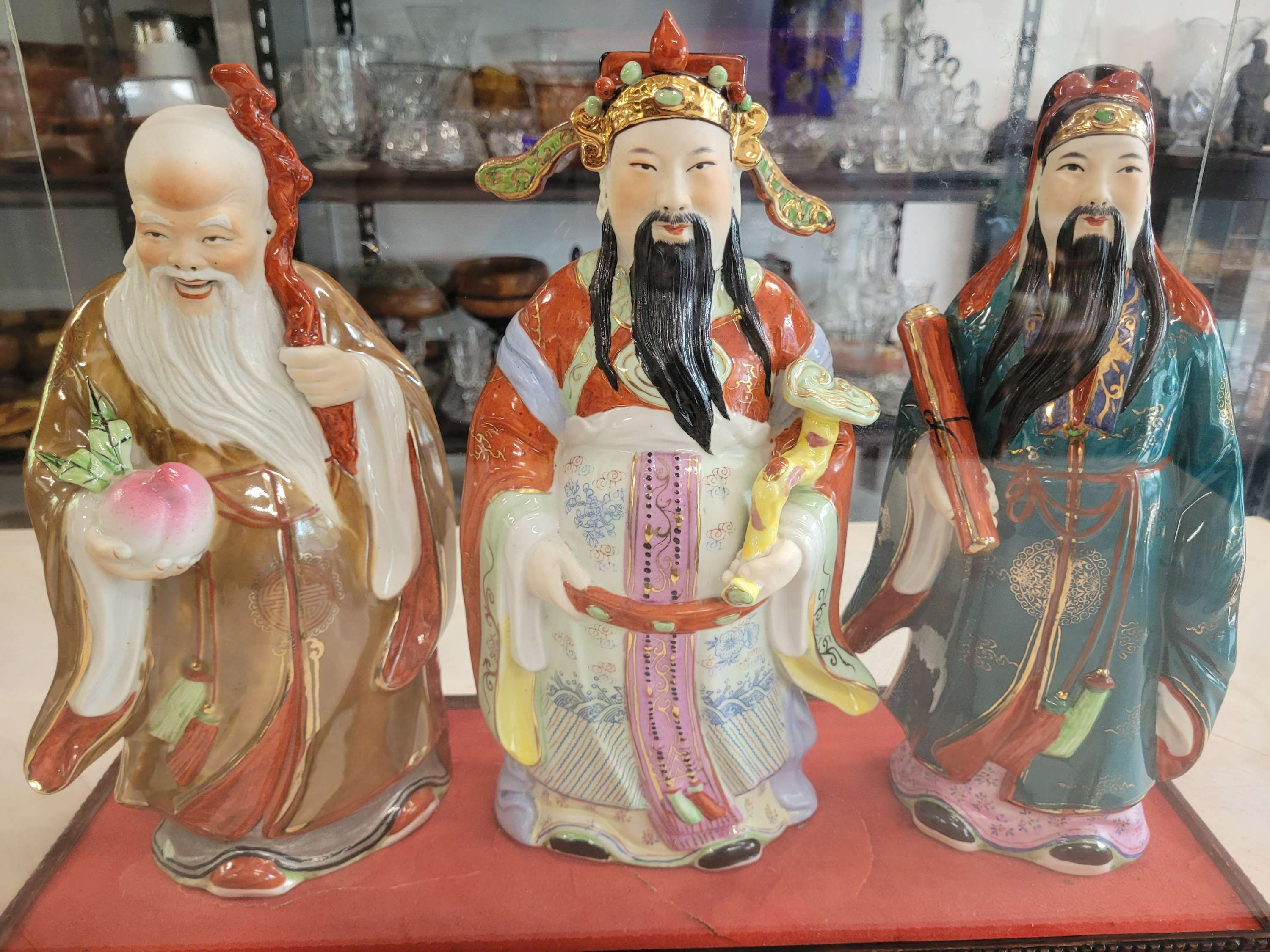 Vintage Fu Lu Shou ceramic figures in glass case 