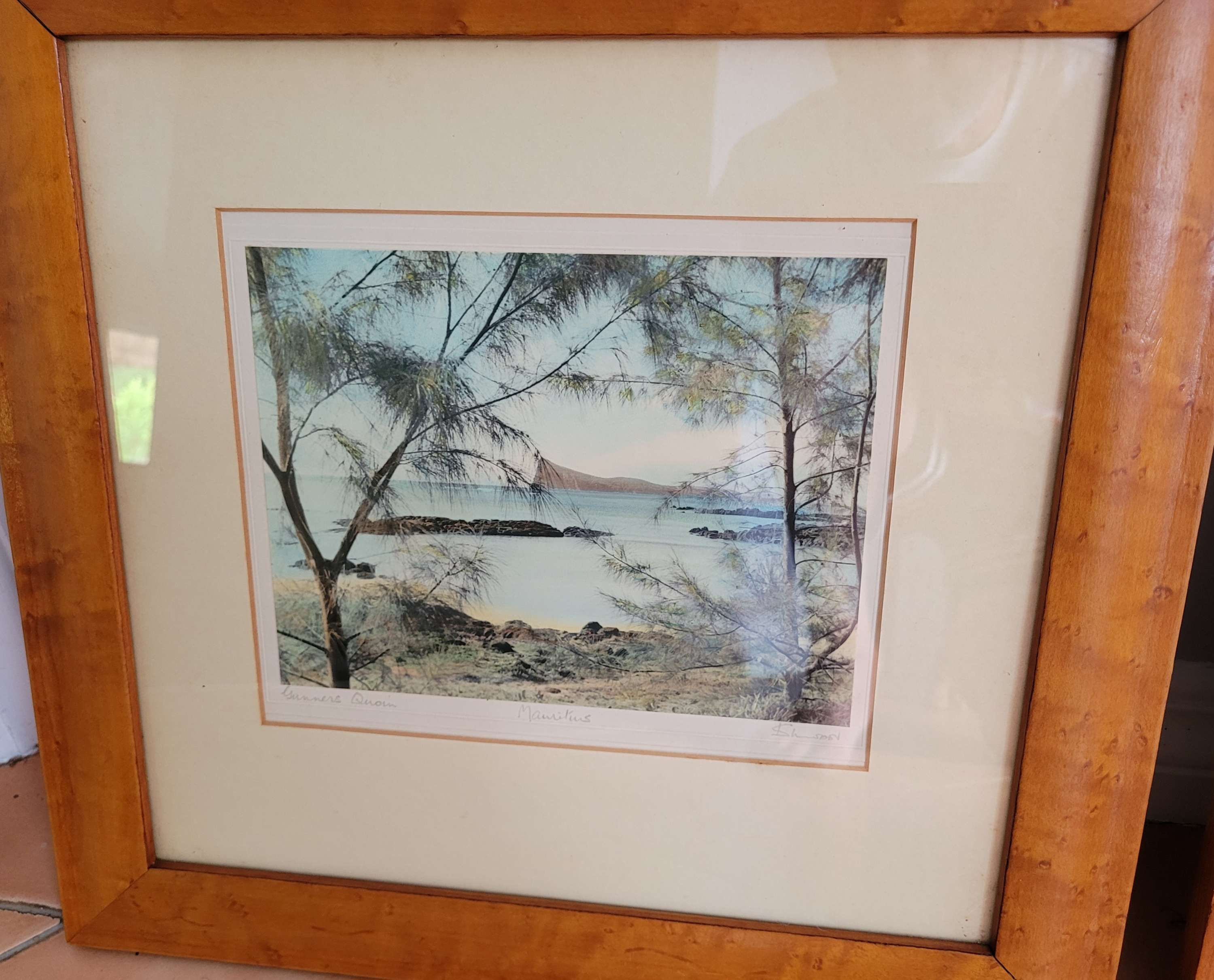 Two hand coloured signed photographs of Mauritius