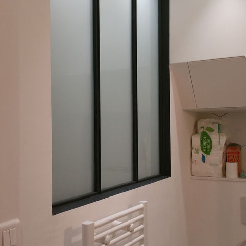 Renovation of a studio in the 11th arrondissement of Paris: glass roof