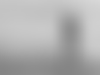 man doing an easy recovery run by the sea