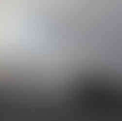 Sonne hinter Wolken und Nebel