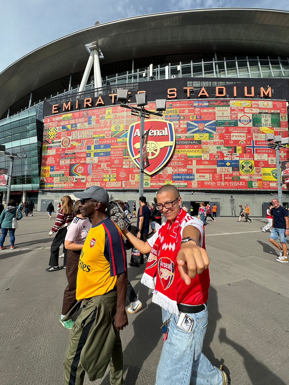 Ashton and her dad outside the Emirates