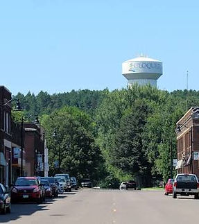 Downtown street view with the Altoona water tower in the background.