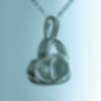 a heart-shaped custom photo necklace in sterling silver, suspended from a chain