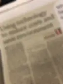 Photo of newspaper cut out about this article